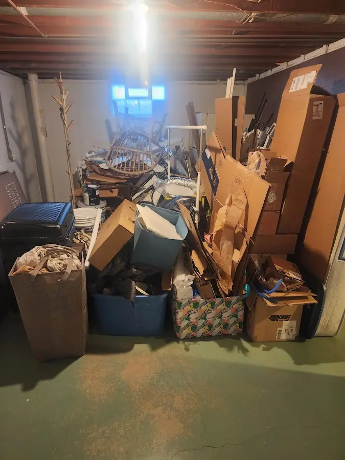 Roll-off dumpster container at job site for Roll Off Dumpster Rental in Spring Ridge